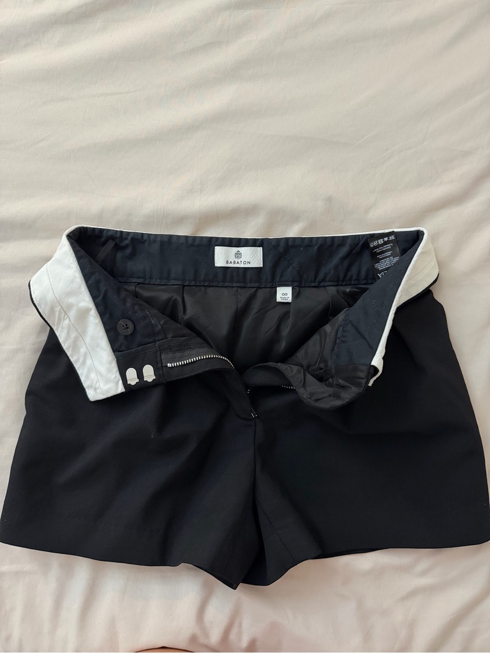 Aritzia Babaton Black High-Waist Tailored Shorts with White Waistband